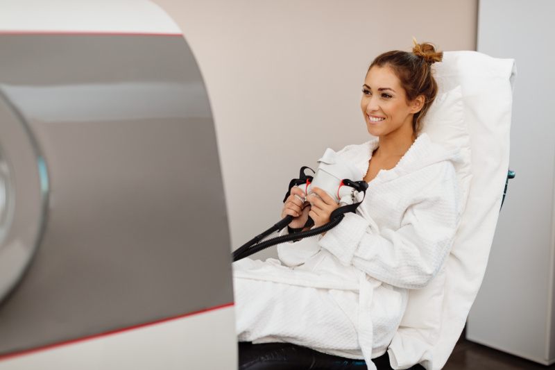 Woman going into Hyperbaric Oxygen chamber.