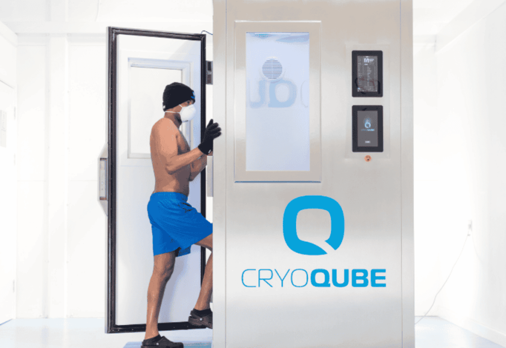man entering whole-body cryotherapy chamber